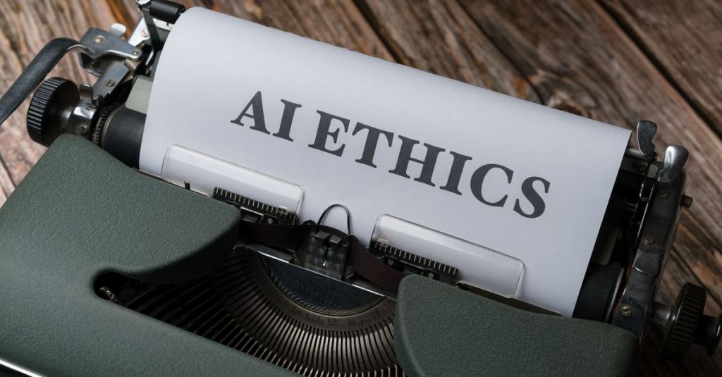 Retro typewriter with 'AI Ethics' on paper, conveying technology themes.