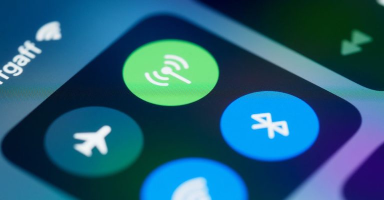 Detailed close-up image of a smartphone's control center showing various connectivity icons.