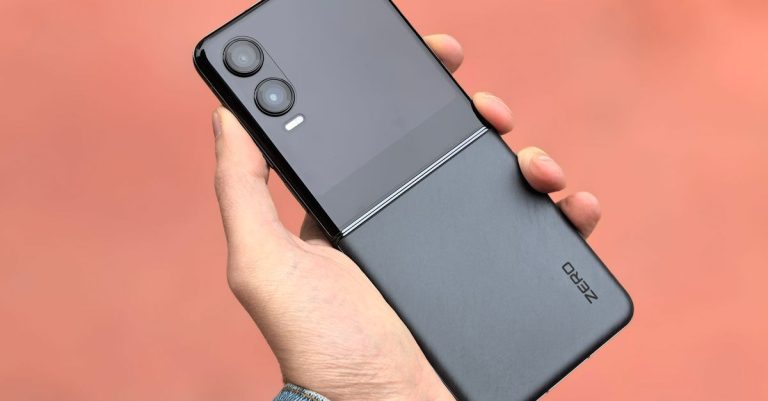Close-up of a hand holding a modern black flip smartphone, ideal for tech and lifestyle concepts.
