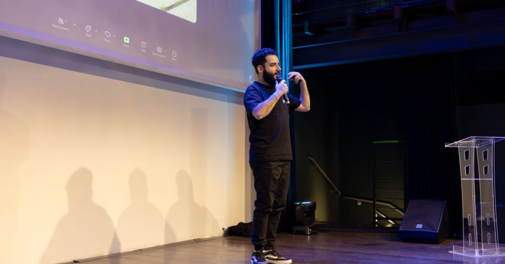 Energetic speaker delivering a talk at a corporate event