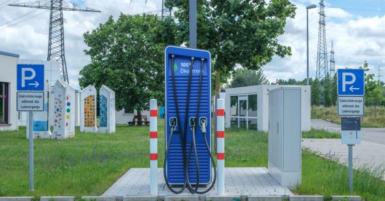 Public charging station with eco-friendly design for electric vehicles.