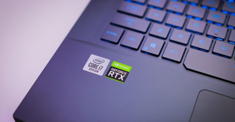 Laptop keyboard with Intel Core i7 and NVIDIA GeForce RTX stickers, symbolizing high-performance computing power.