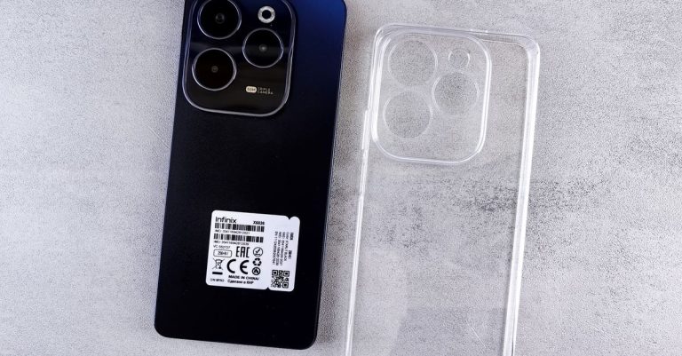 Top view of Infinix Hot 40 Pro smartphone with transparent clear case on a light background.