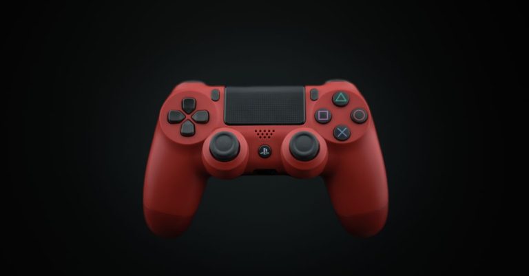 Vibrant red DualShock PS4 controller displayed on a dark background, highlighting modern gaming design.