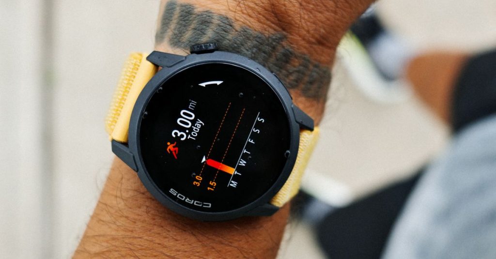 Close-up view of a smartwatch tracking a 3-mile run, worn by a male runner in Houston, TX.