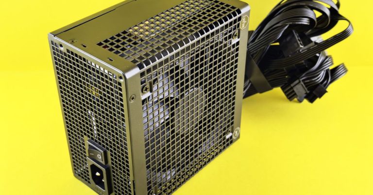 A powerful gaming PSU on yellow background, ideal for desktop setups.